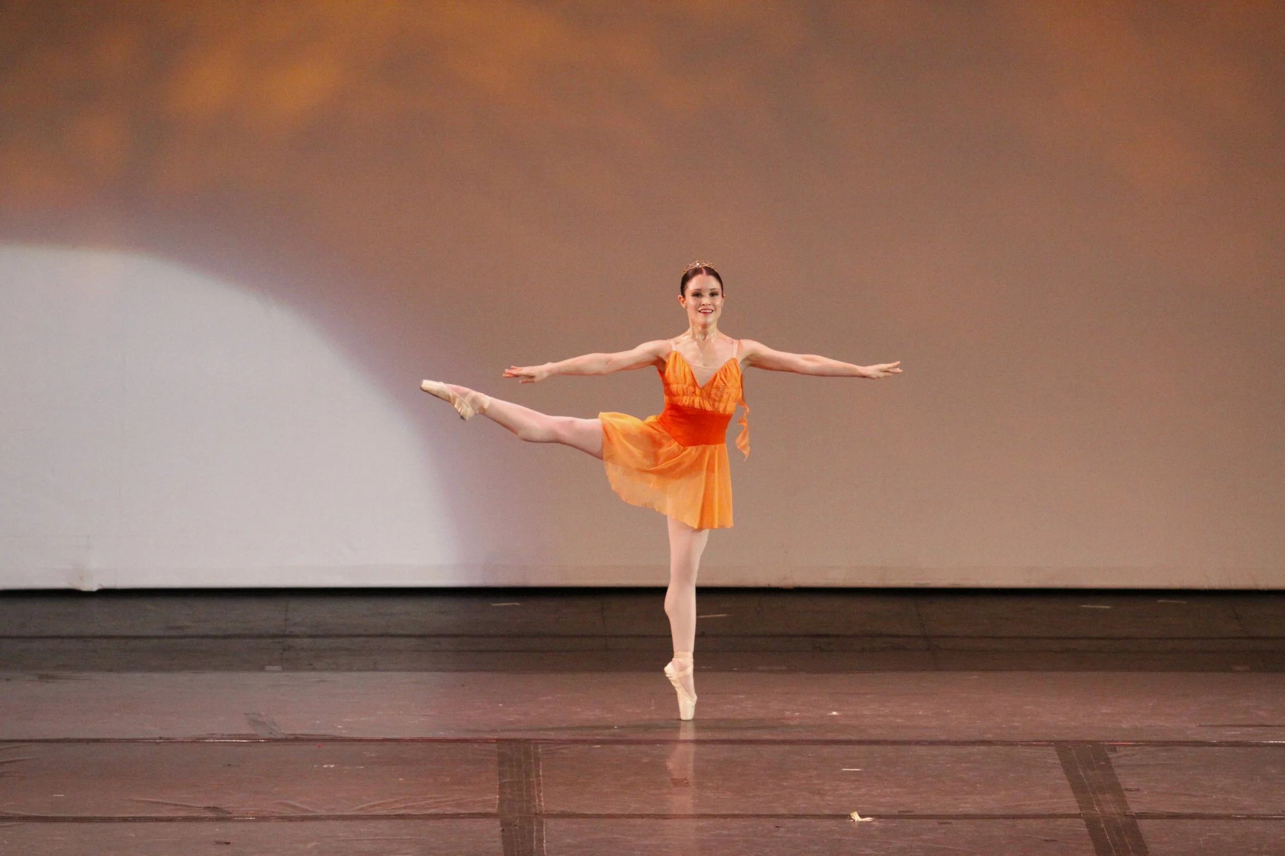    As the goddess of the hunt in  Diane and Acteon , Tiffany Chiang-Janolo wears a tutu using two shades of orange. Personifying beauty, grace and strength, Diane wanders through the forest and encounters the hunter Acteon who is instantly smitten wi