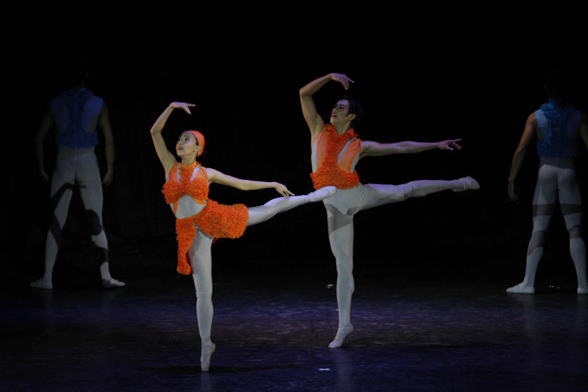    Clad in frilly orange numbers worn over gray bodysuits, Mylene Aggabao and Francis Cascaño interpret Josh Groban’s  Alejate   (Just Walk Away)  in Manuel Molina’s  Love Beyond Goodbye . An exploration of the different phases of a relationship as p