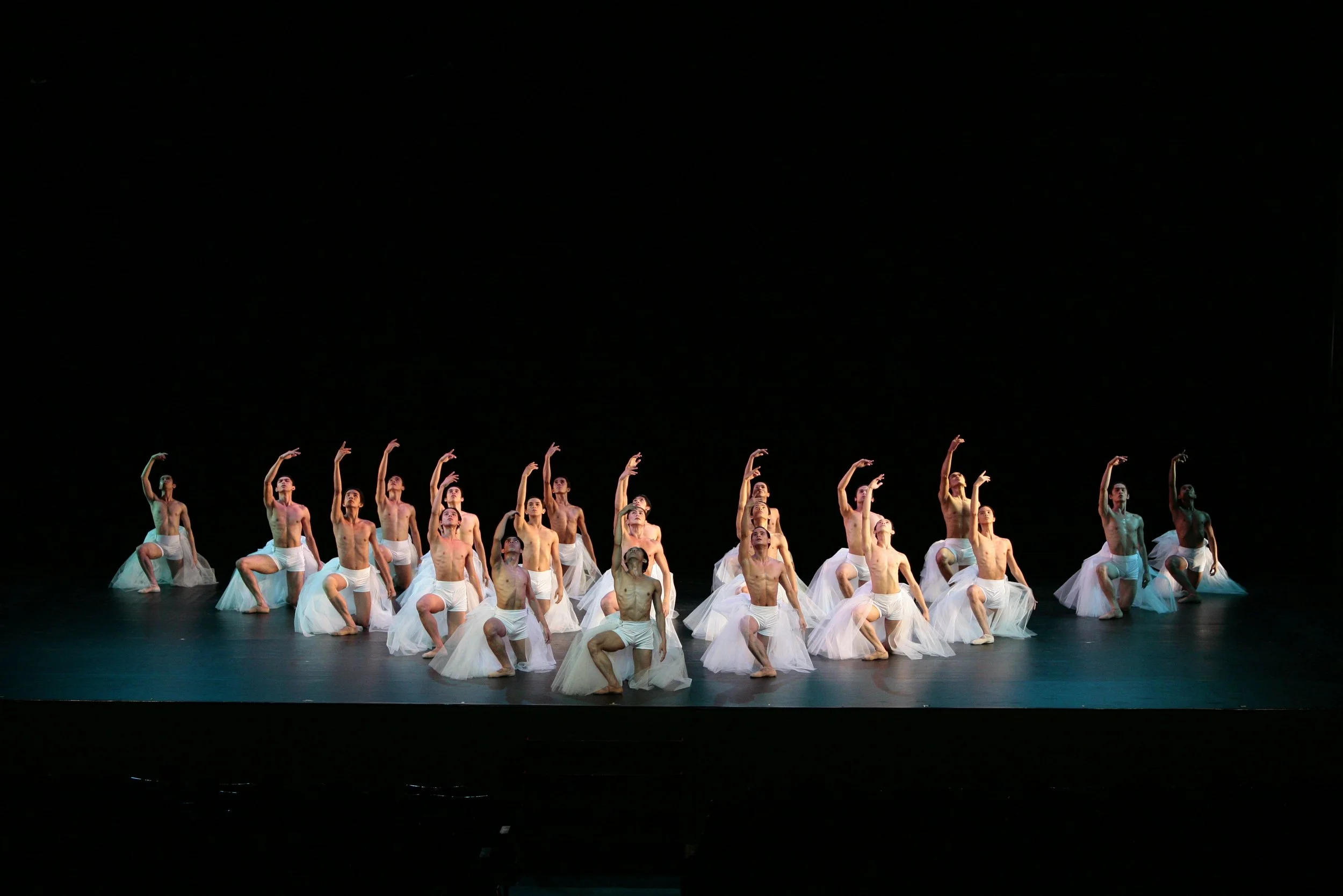    For his all-male contemporary piece,  Less Sylphides  featured in  Duo  (2012) Augustus “Bam” Damian III borrows the characteristic fabric traditionally reserved for the female corps. With danseurs wearing white tulle partially wrapped around whit