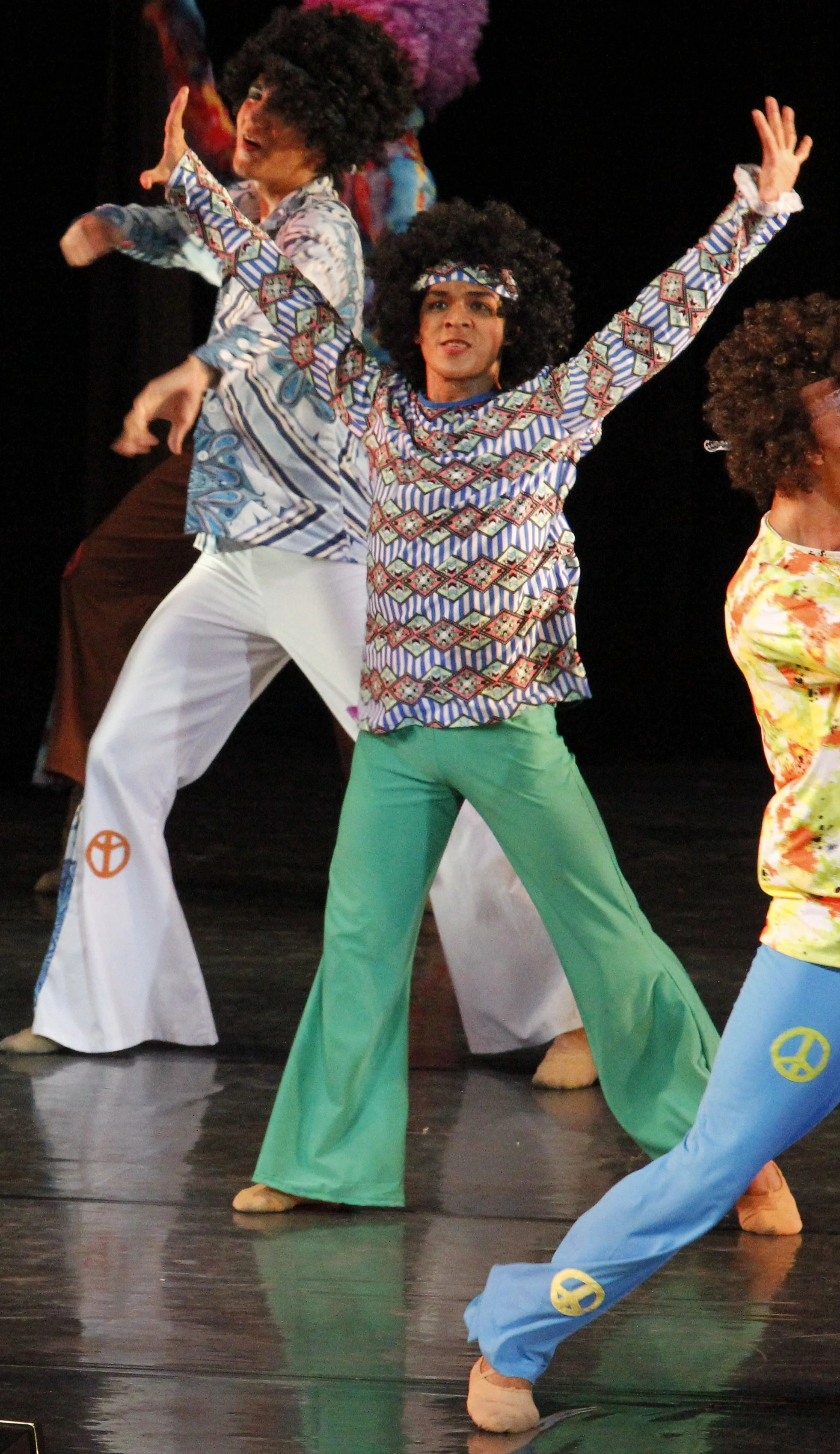    Bell-bottomed teal pants, a geometrically patterned top with matching hair band, and an Afro hairdo complete the groovy vibe for Gerardo Francisco Jr. in a Mamma Mia Medley featuring ABBA’s hit songs. The number served as the finale for  Ballet &a
