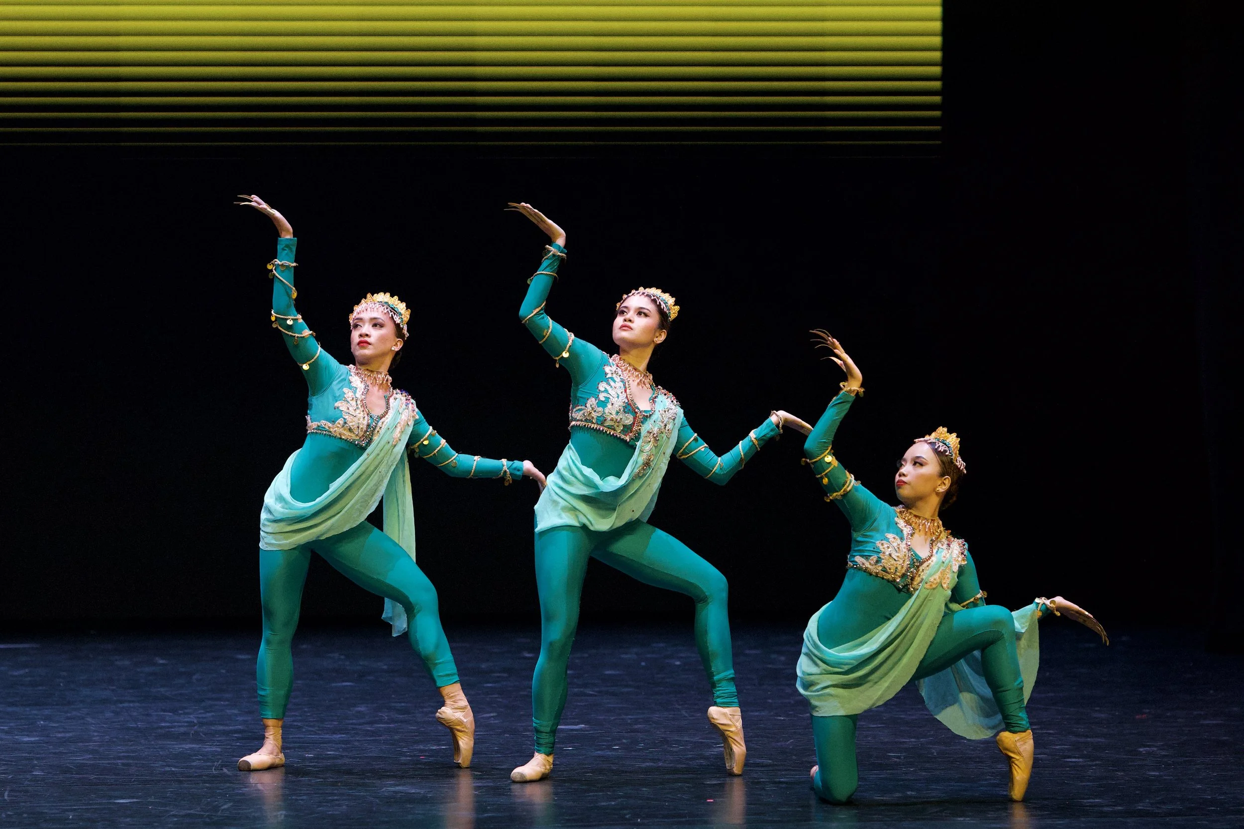    National Artist for Dance Agnes Locsin’s  Sayao sa Pamlang  is a suite of five pieces inspired by the rich culture of the Philippine South. In Pang-alay, three women wearing teal catsuits draped in aquamarine sheaths – Jessa Balote, Angelika Tagup