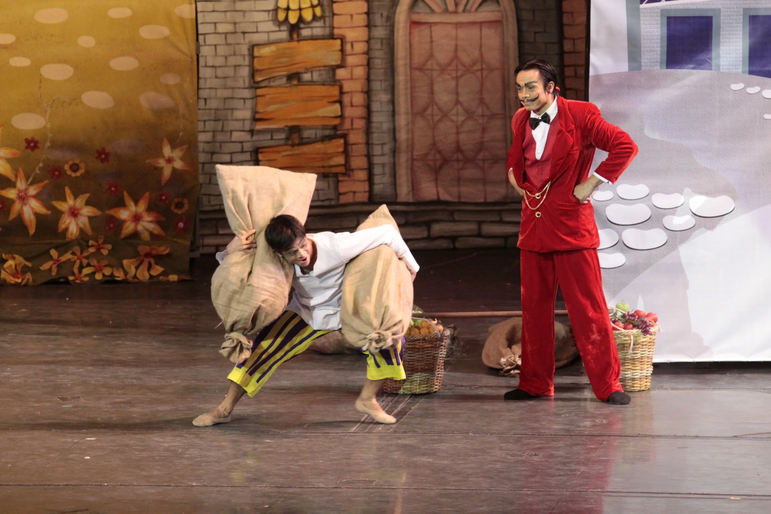   Ang Mahiwagang Biyulin , one-third of the ballet comprising  Tatlong Kuwento ni Lola Basyang,  is a story that best illustrates unfair labor practice as it casts an exploitative boss in Ahab opposite an oppressed worker in Rodrigo. The young man is