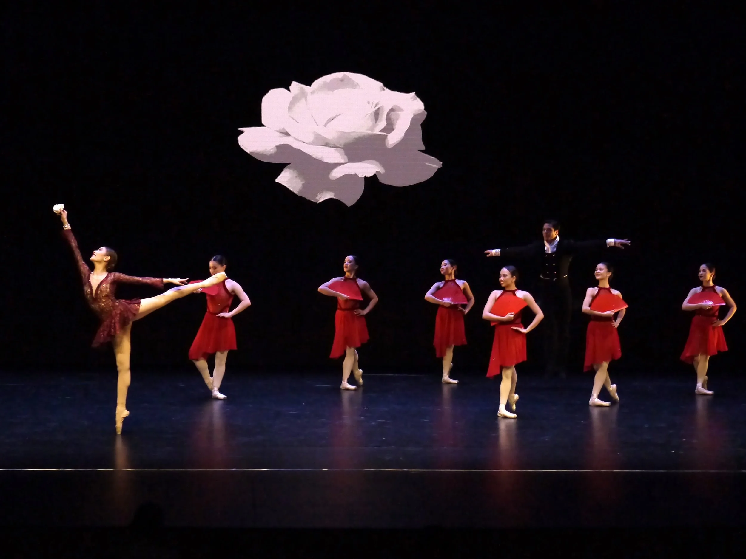    The white rose that Violetta (Abigail Oliveiro, left) clutches in her hand symbolizes the passion that Alfredo (Mark Sumaylo, back) has expressed for her in Lisa Macuja Elizalde’s  La Traviata,  performed in  Ballet Manila’s Greatest Hits in Malay