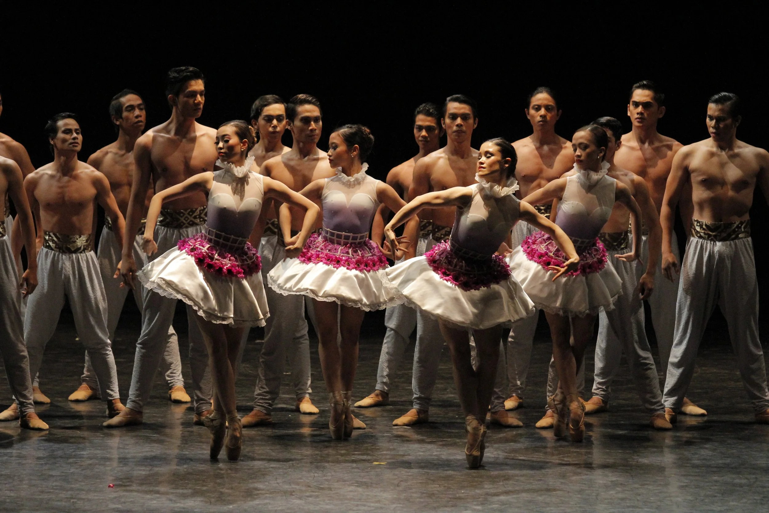    A profusion of pink flowers adorns the white tutus of four ladies (Joan Emery Sia, Jasmine Pia Dames, Tiffany Chiang and Jessa Balote) cast in Annabelle Lopez Ochoa’s appropriately titled  Bloom , as presented in  BM 21  (2016). Their skirts also 