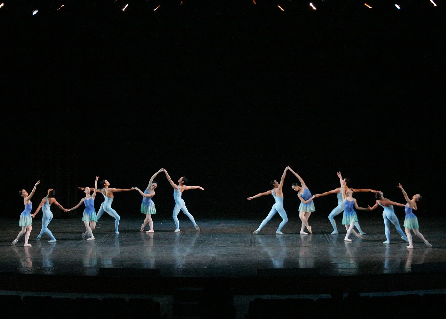    Using the evocative music of Sir Edgar Elgar, Osias Barroso Jr.’s  Sonata  explores the nature of romantic relationships with a number of couples in complementing outfits in blue. The piece was premiered in  Music, Trio, Magic  (2007) where a viol