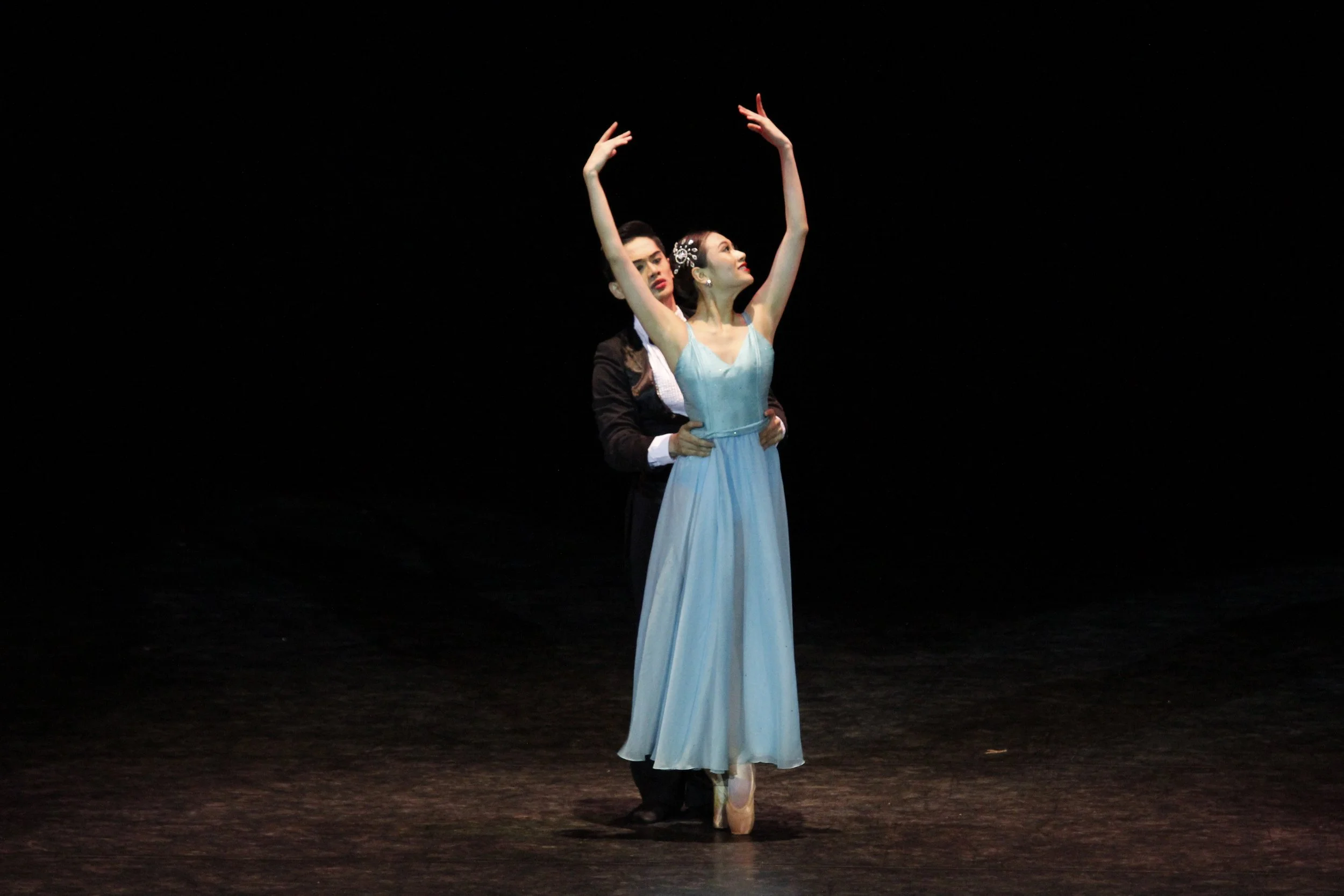    Abigail Oliveiro wears a powder-blue gown as she dances with Alfren Salgado who is in a suit and bow tie, one of several similarly clad couples cast in Jonathan Janolo’s  Musika’t Pag-ibig . The choreography was one of several showcased in  Kay Ga