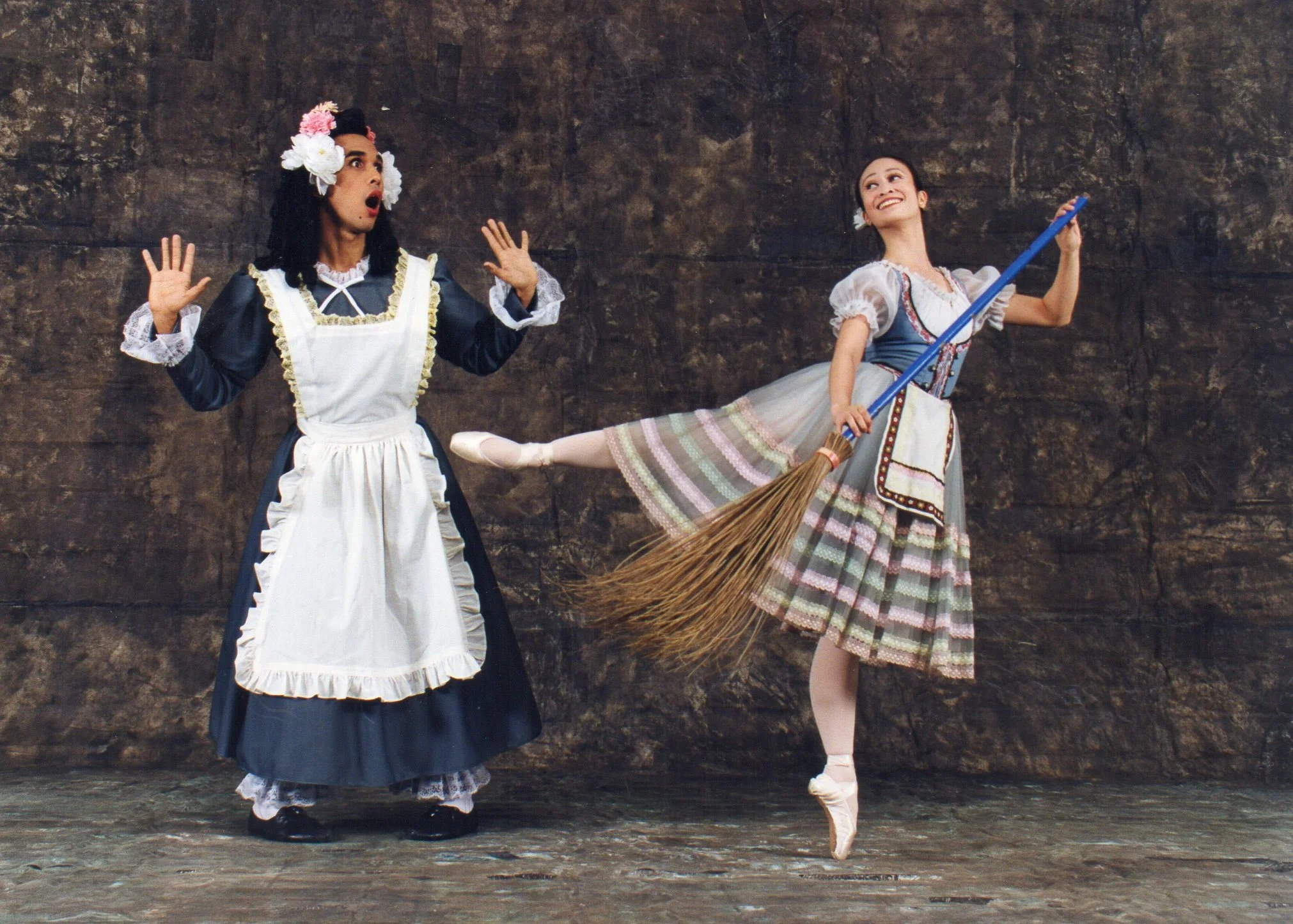    Mother Simone (Christopher Mohnani) almost can’t keep up with her irrepressible daughter Lise (Pamela Asprer) in  La Fille Mal Gardee . She has big plans for her only child—to marry her off to a wealthy man’s son even if she knows Lise favors Cola