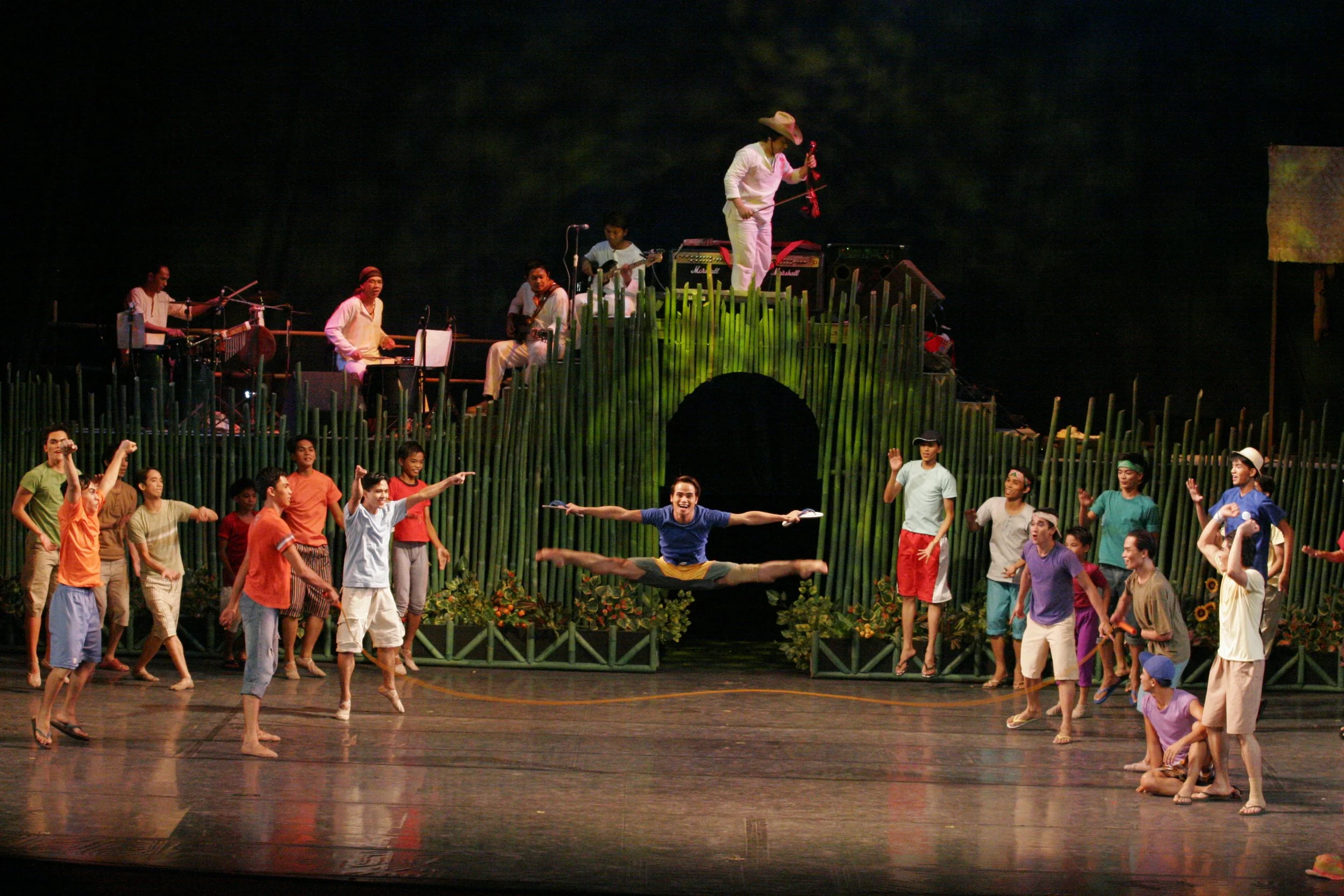    Here’s Alvin Santos showing how  luksong lubid  or jump rope is done, ballet-style. In this traditional children’s game, two players hold the ends of a long rope and swing it in a continuous circle while other players take turns leaping over it in