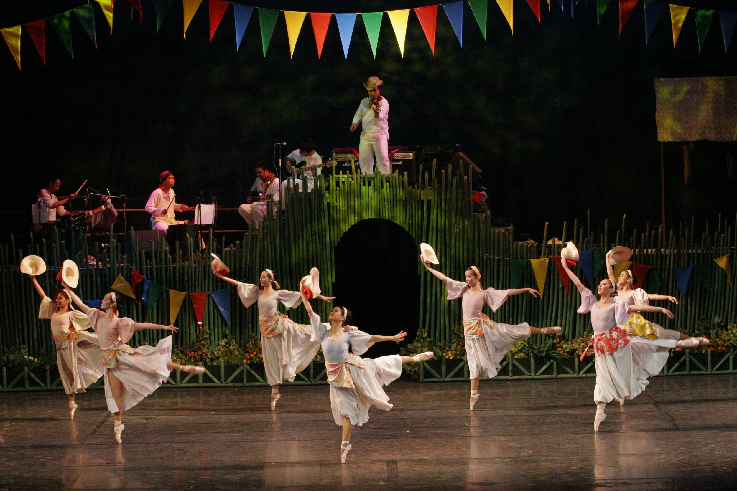    This number is inspired by the  subli , a folk dance from Batangas where the female dancers walk on their half-toes while performing refined, delicate wrist and finger gestures.   