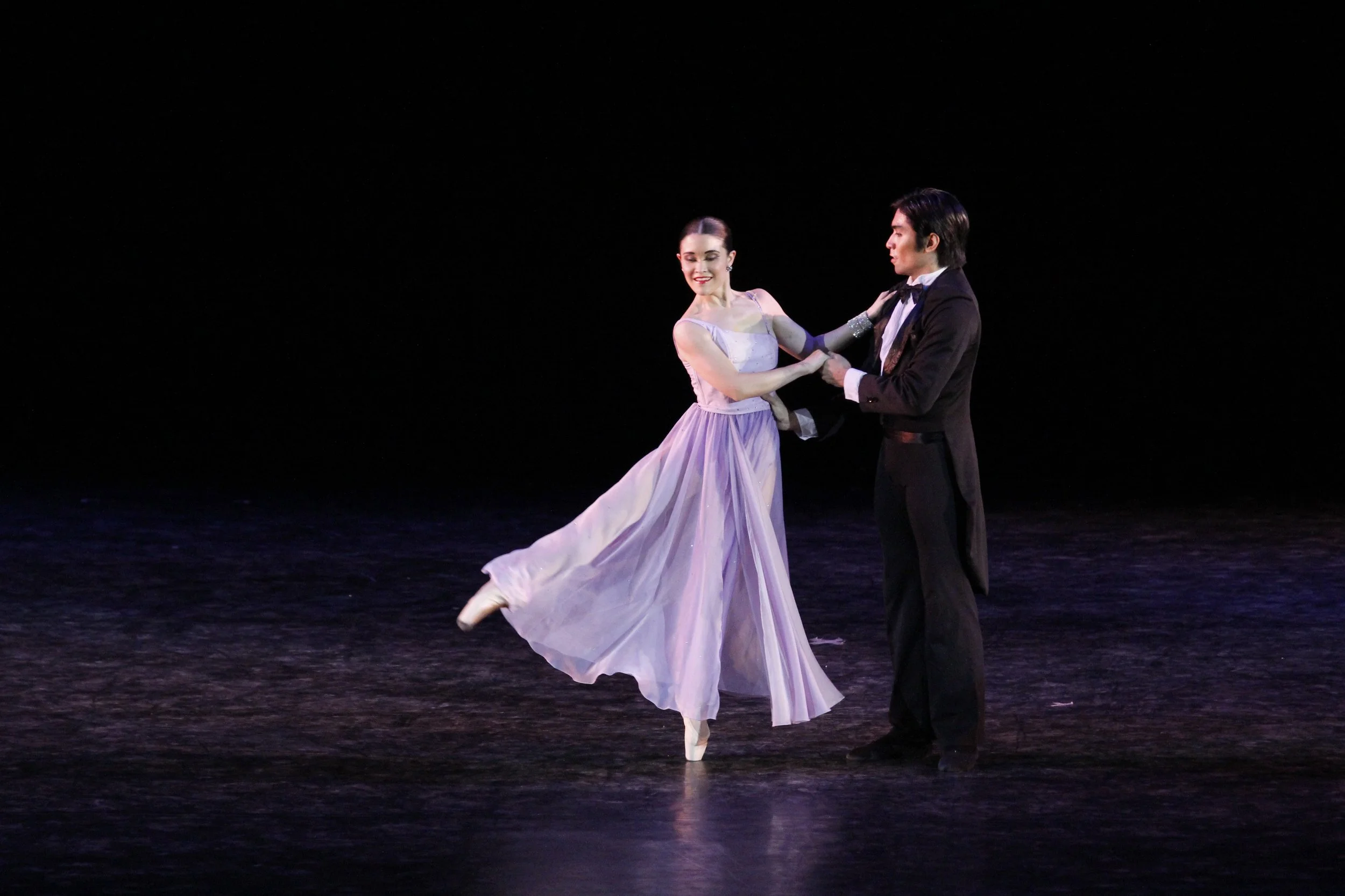    Channeling a ballroom vibe, Tifanny Chiang-Janolo wears a glamours gown in lilac opposite Romeo Peralta Jr. in a tuxedo for their part in the contemporary ballet piece  Musika’t Pag-ibig . Choreographed by Jonathan Janolo, it premiered in  Kay Gan