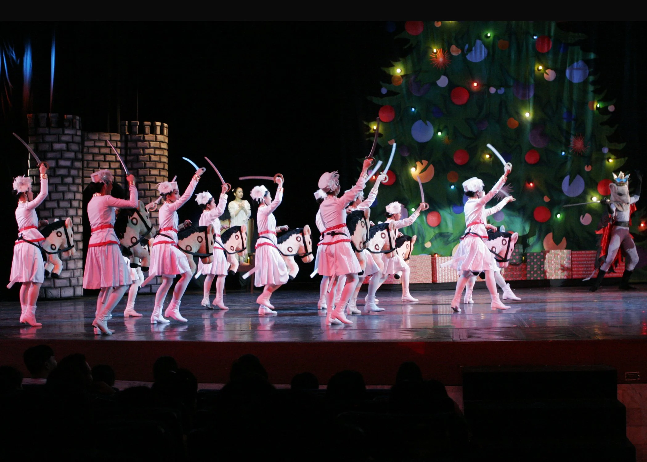    Galloping on their ponies, an army of sword-wielding female toy soldiers come to the aid of the Nutcracker Prince in his battle against the Mouse King in the Christmas Eve showdown in  The Nutcracker  (2005). Photo by Ocs Alvarez   