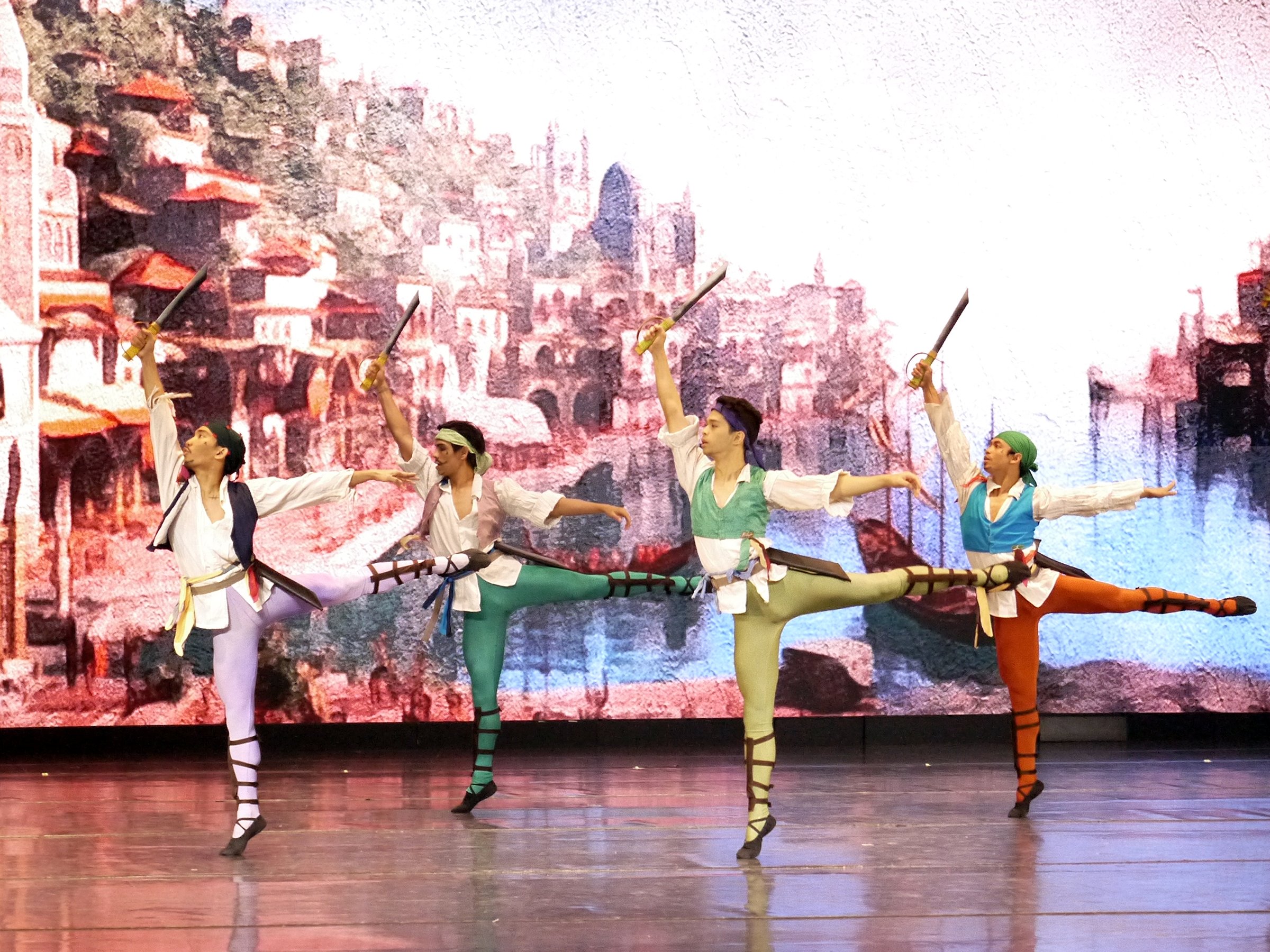   Cutlasses in hand, these pirates (from left, JC Concepcion, Raymond Salcedo, Jos David Andes and Sean Pelegrin) display their dueling skills in Lisa Macuja Elizalde’s  Le Corsaire  (2024). Photo by Giselle P. Kasilag   