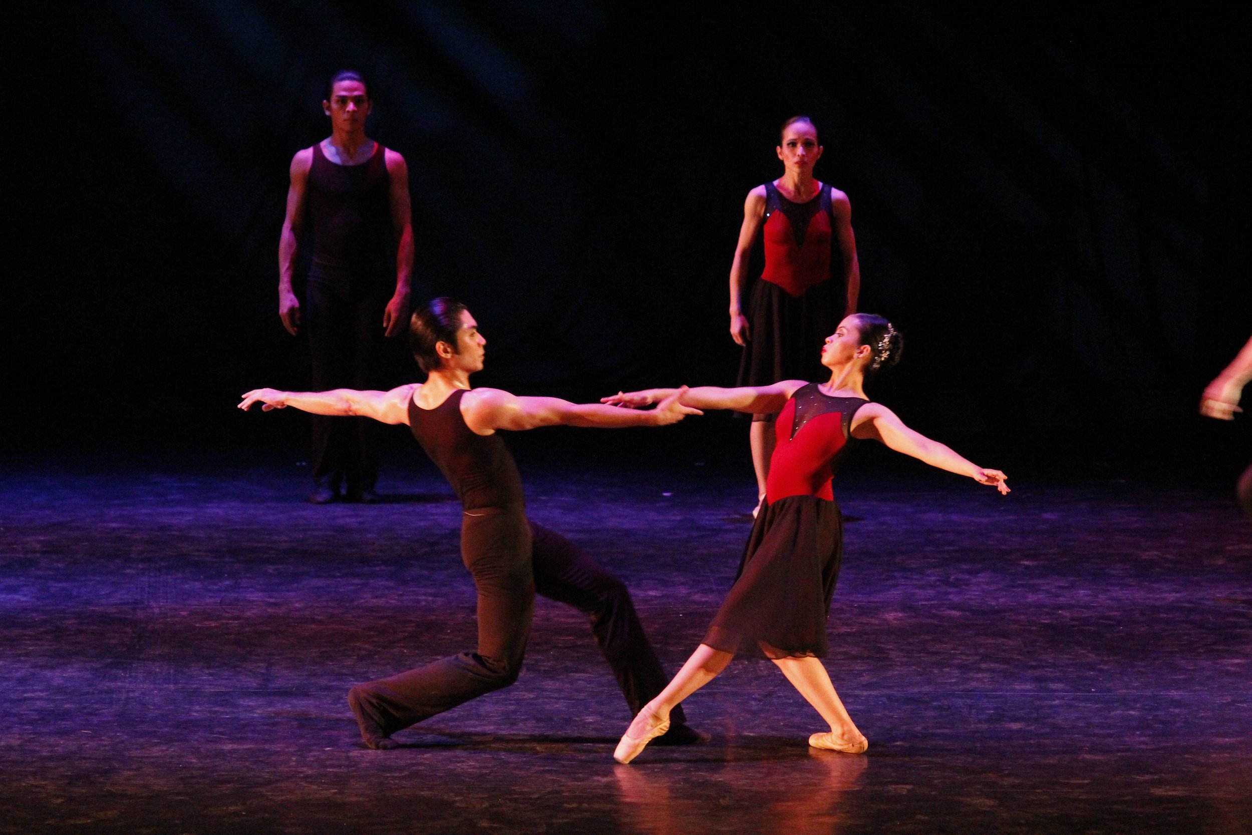    Maroon serves as the pop of color in  Shutter , a choreography by Francis Jaena that has a predominantly black look. The dramatic piece combines jazz, modern ballet and contemporary dance in its exploration of a camera’s movements and sounds as it