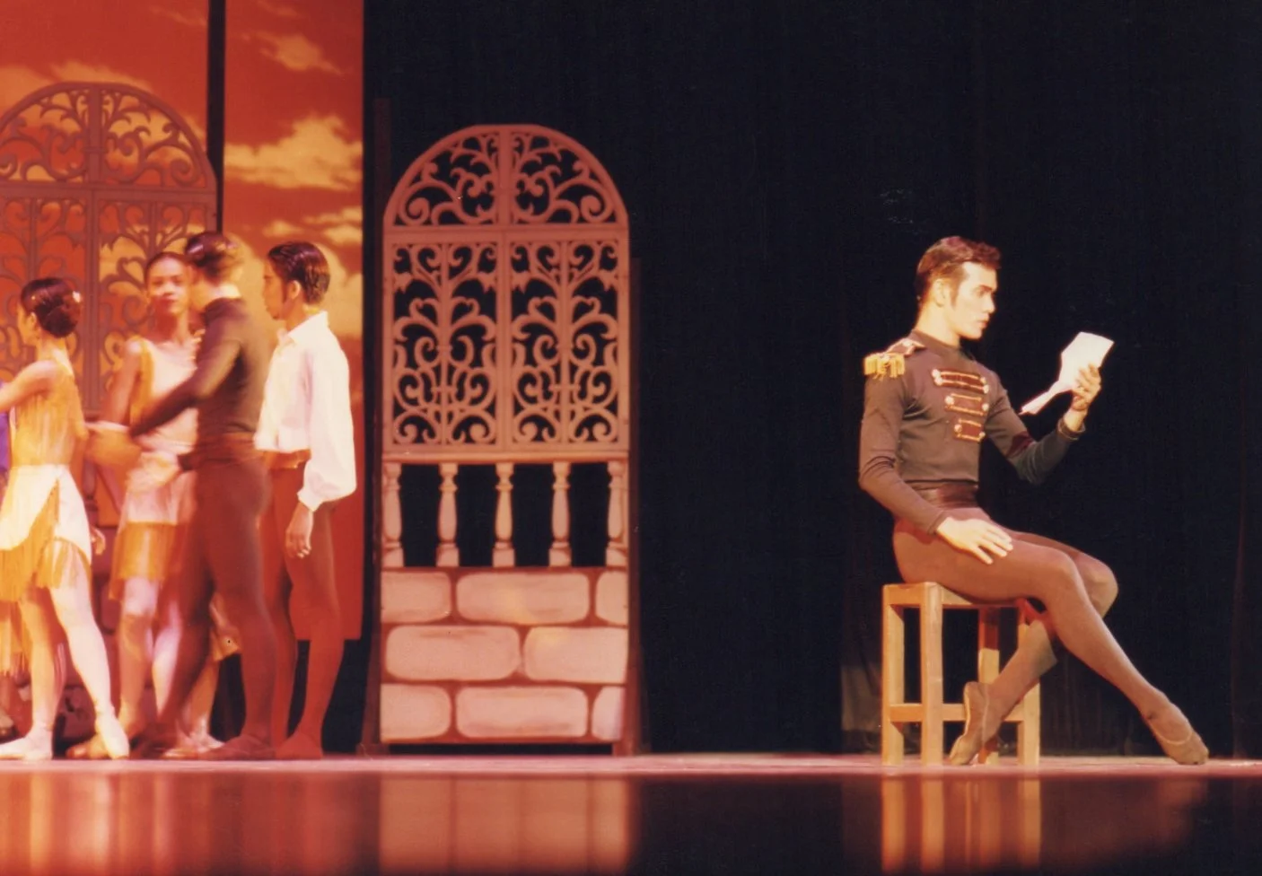    The soldier Don Jose (Osias Barroso Jr.) reads a letter from his mother in a scene from Eric V. Cruz’s  Carmen , based on Georges Bizet’s opera. His mother is asking him to return home, urging him to marry Micaela who has hand-delivered the letter