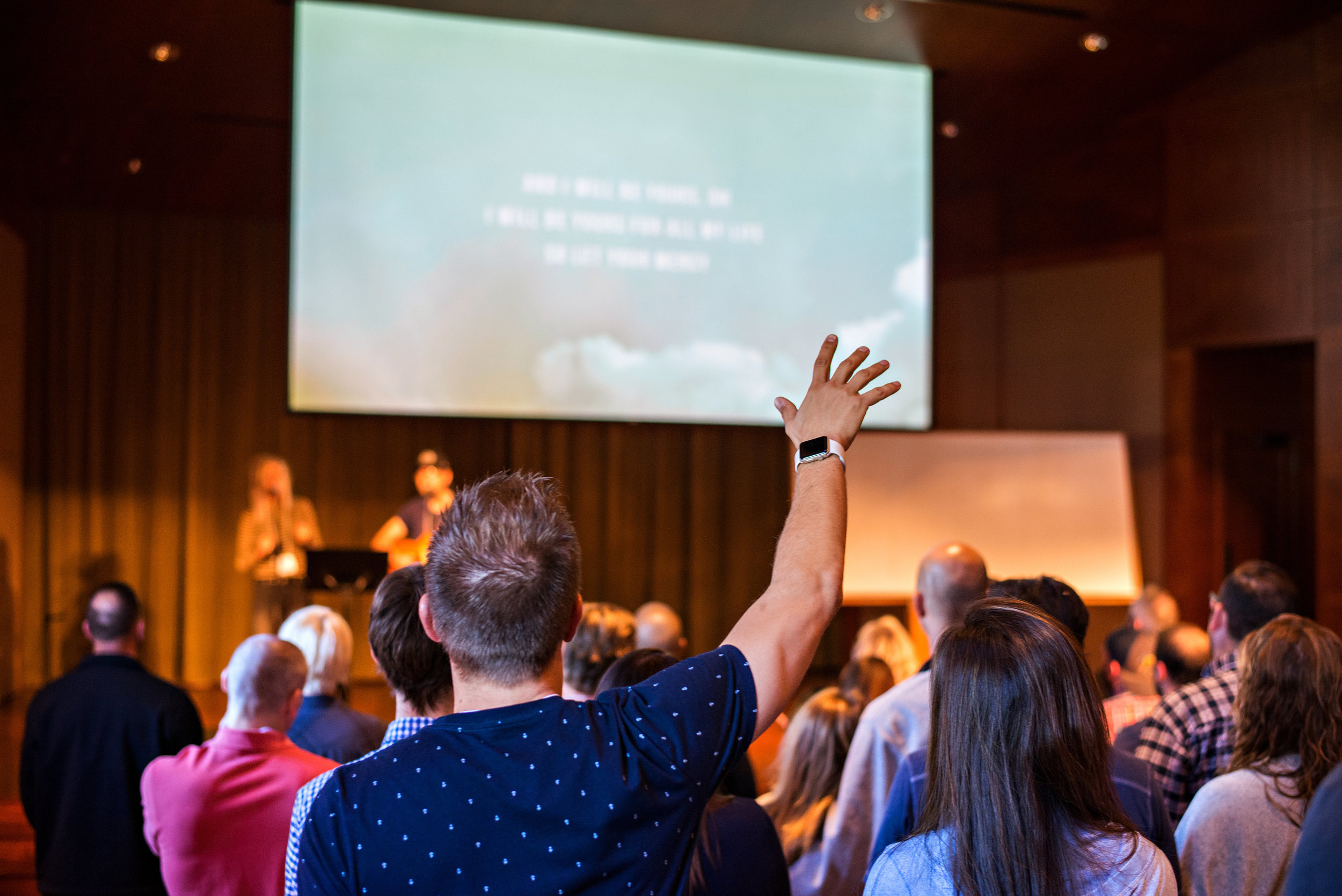 A shot captured by Allen and Carol Photography. Love seeing my man worship the Lord! And now, we can see what we look like from the back of our heads too. :) 