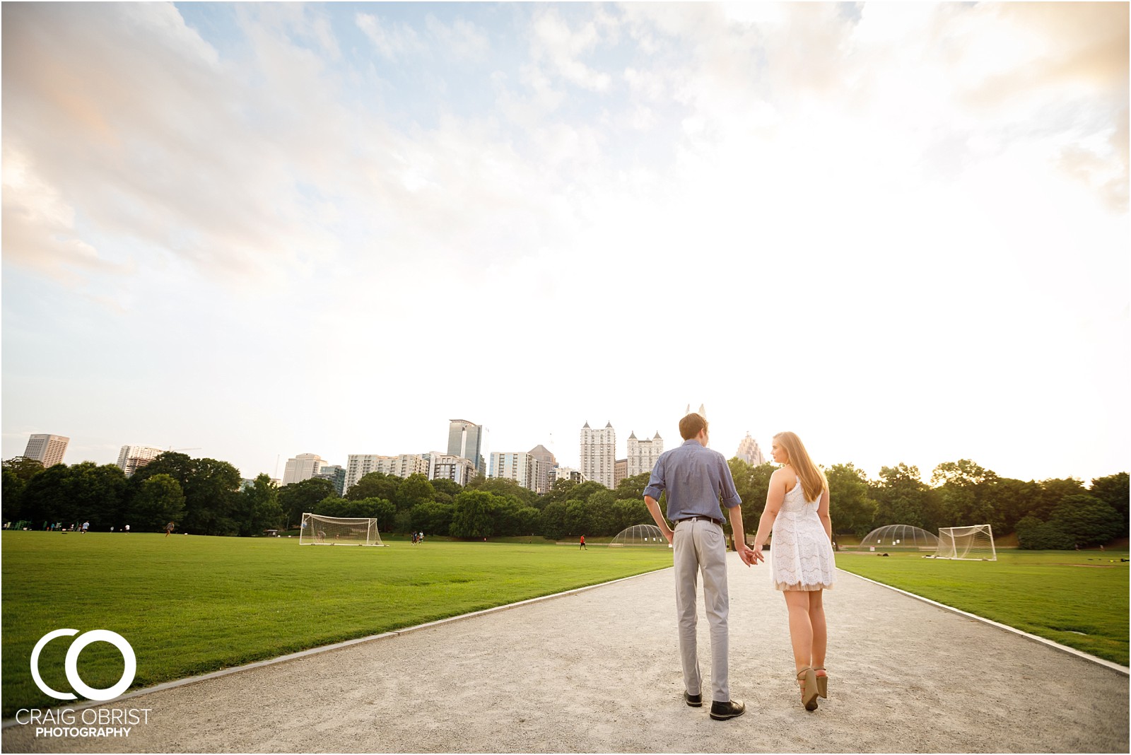 Piedmont park engagement wedding portraits Atlanta Skyline_0018.jpg