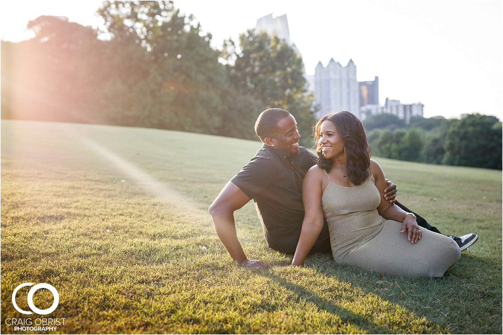 Piedmont Park Merecedes Benz Stadium Atlanta Skyline Enagagement Portraits_0018.jpg