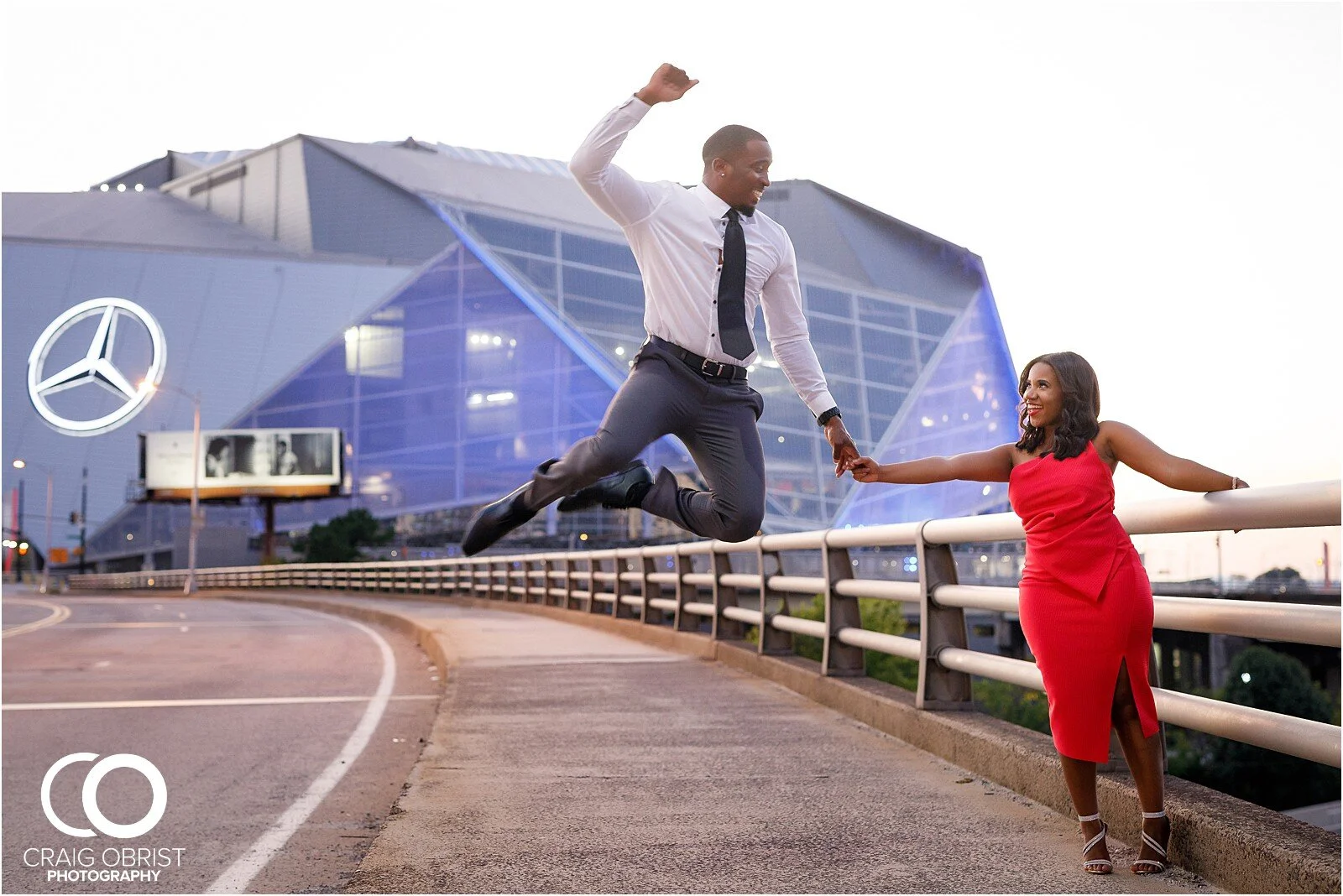 Piedmont Park Merecedes Benz Stadium Atlanta Skyline Enagagement Portraits_0028.jpg