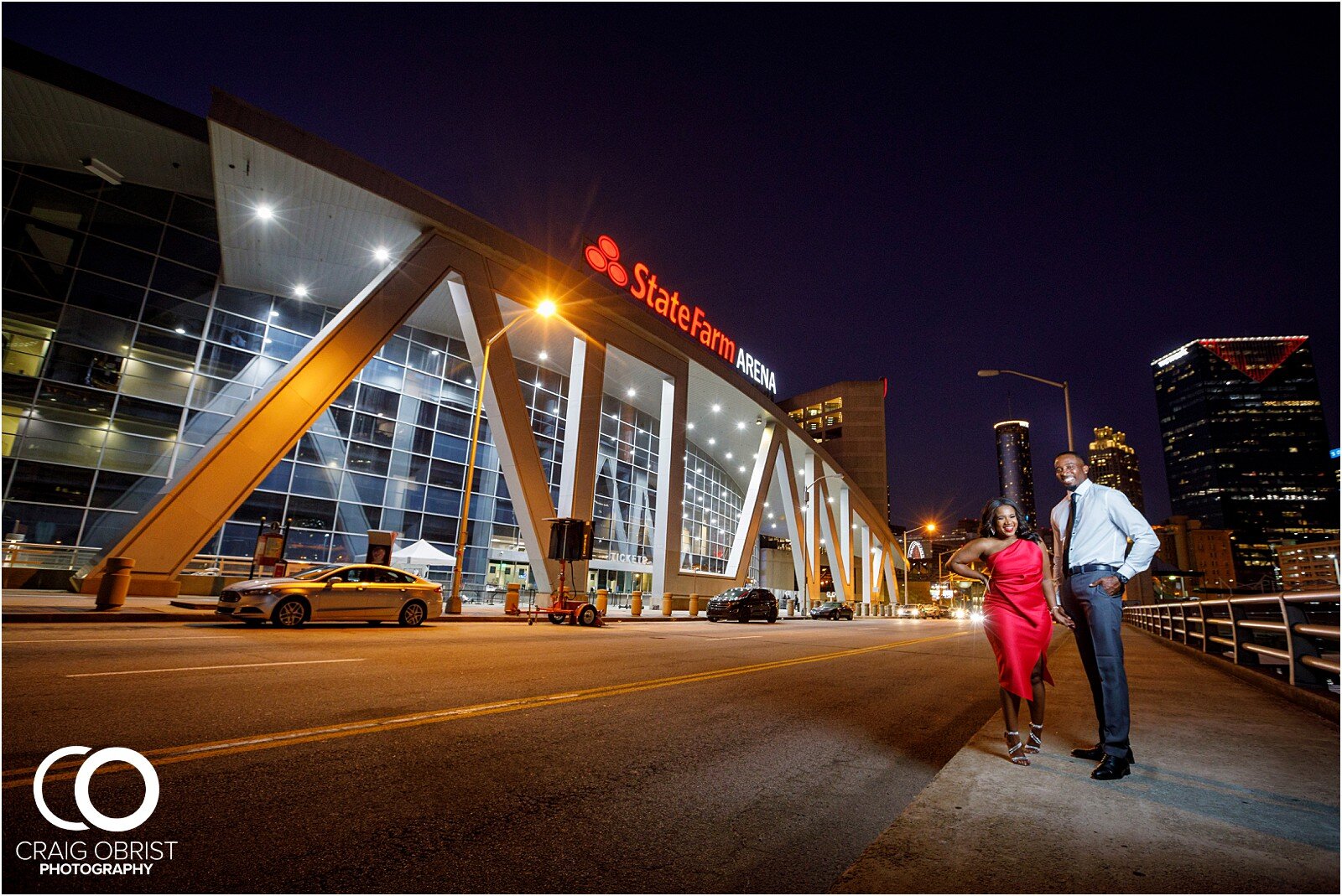 Piedmont Park Merecedes Benz Stadium Atlanta Skyline Enagagement Portraits_0032.jpg