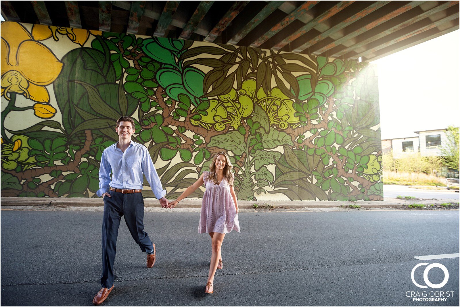 Ponce City Market Jackson Street Bridge Atlanta Skyline Engagement Portraits_0026.jpg