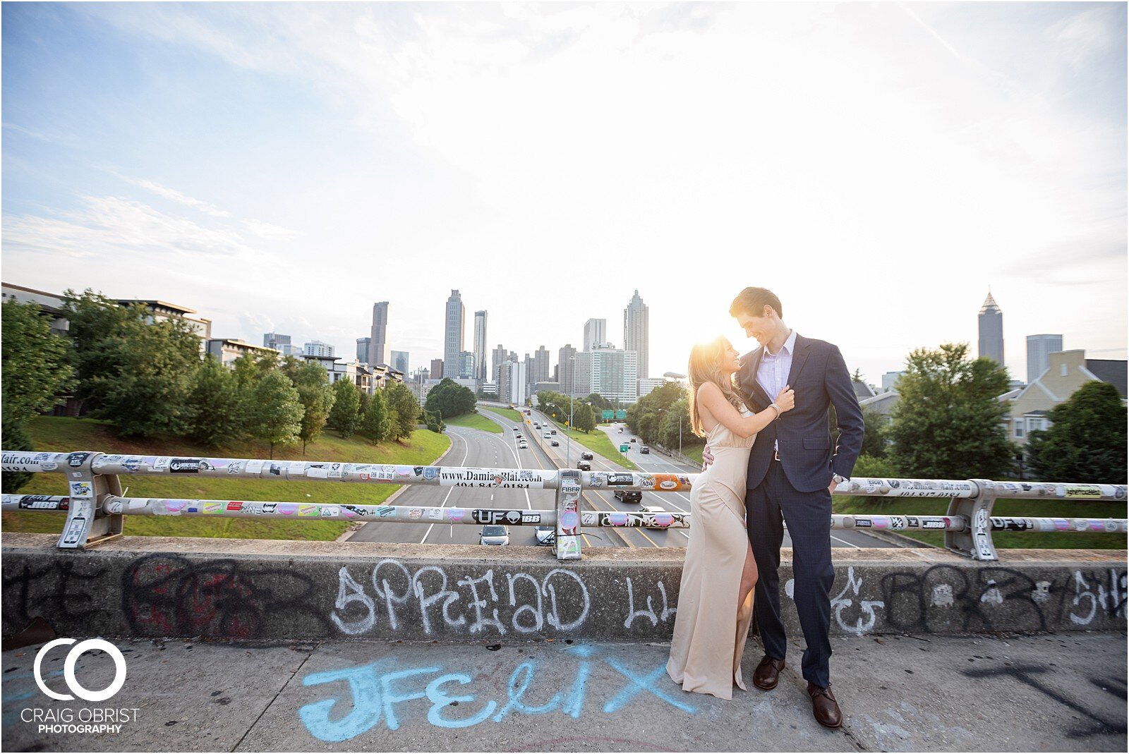 Ponce City Market Jackson Street Bridge Atlanta Skyline Engagement Portraits_0027.jpg