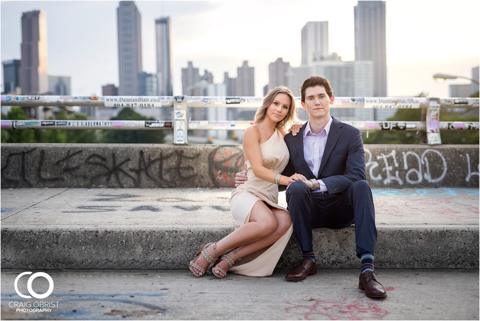 Ponce City Market Jackson Street Bridge Atlanta Skyline Engagement Portraits_0039.jpg