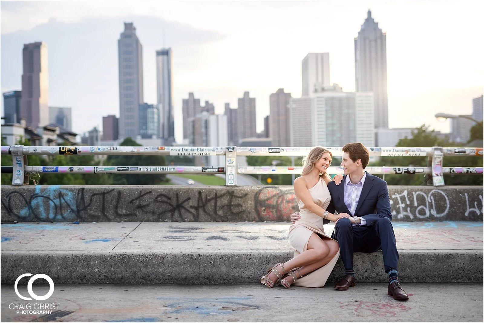 Ponce City Market Jackson Street Bridge Atlanta Skyline Engagement Portraits_0040.jpg