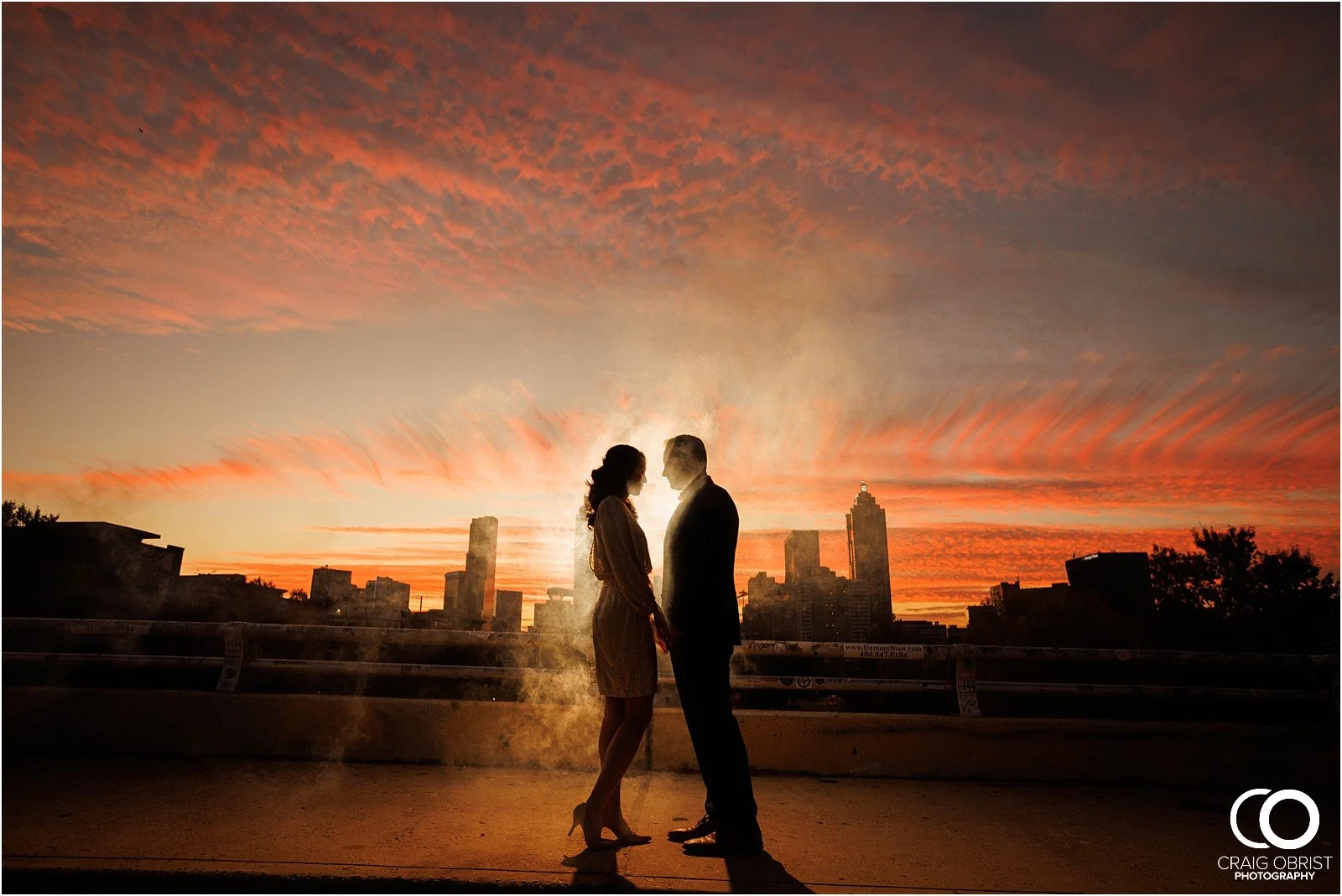 Ponce City Market Atlanta Beltline Skyline Jackson Street Bridge Engagement Portraits_0032.jpg