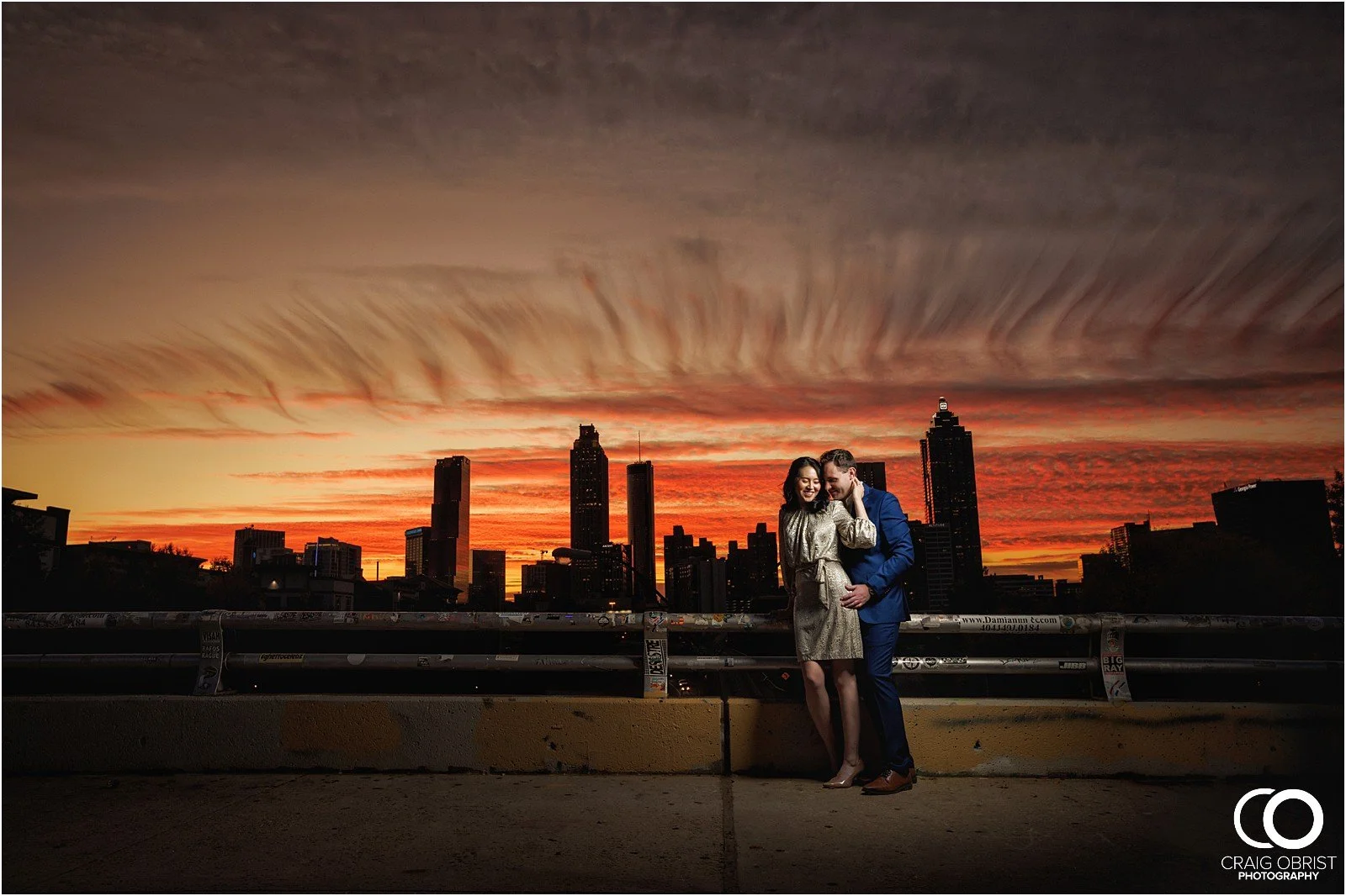 Ponce City Market Atlanta Beltline Skyline Jackson Street Bridge Engagement Portraits_0035.jpg