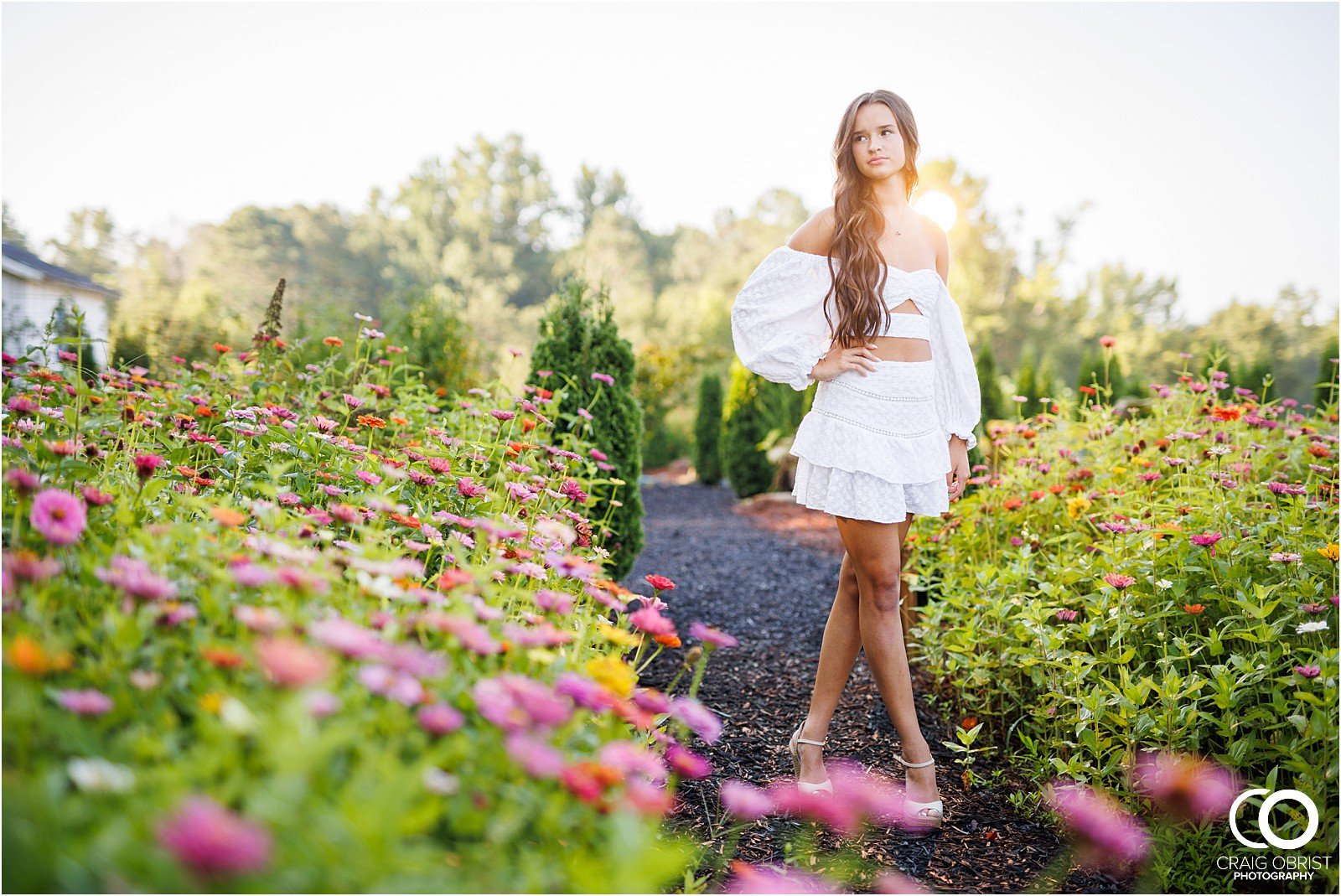 West Milford Farm Senior Portraits Greenhouse Flowers Sunset Swing_0021.jpg