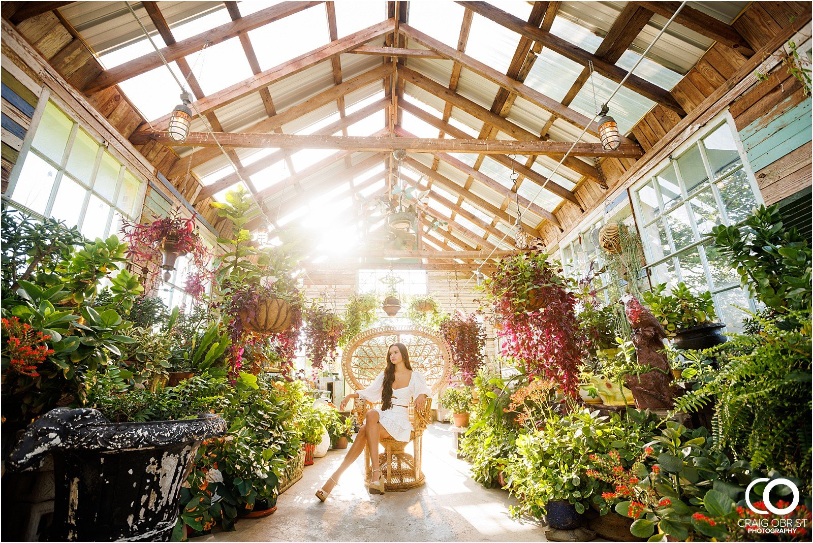 West Milford Farm Senior Portraits Greenhouse Flowers Sunset Swing_0028.jpg