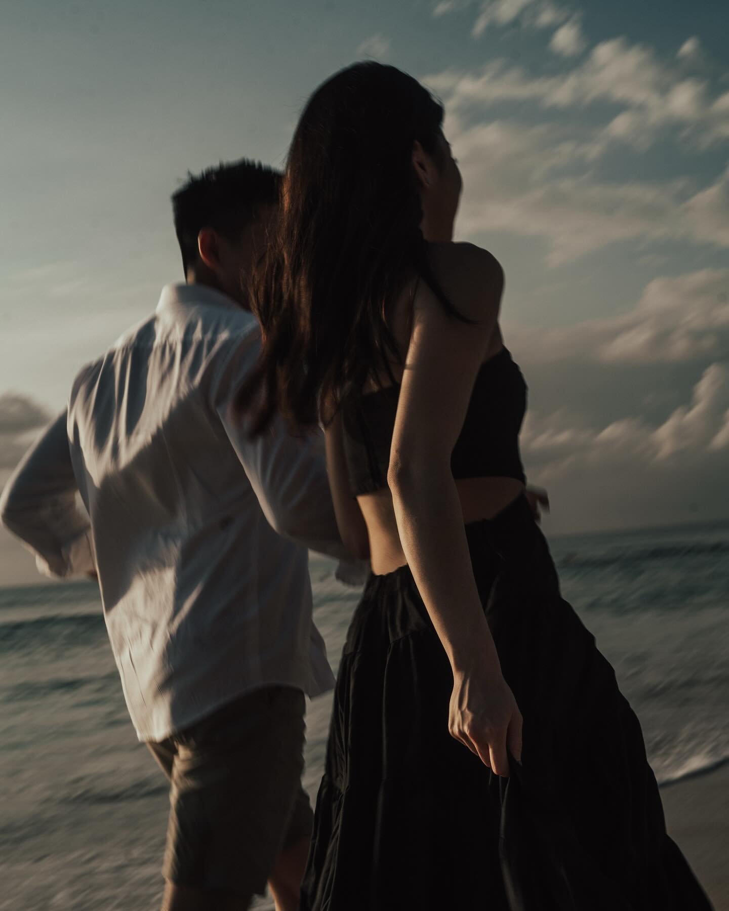 Spent a golden sunset with Carissa and Garry, strolling along the shore as they shared the beautiful story of their journey together. The sound of the waves, the colours of the sky, and the way they looked at each other, it was all so beautiful and f