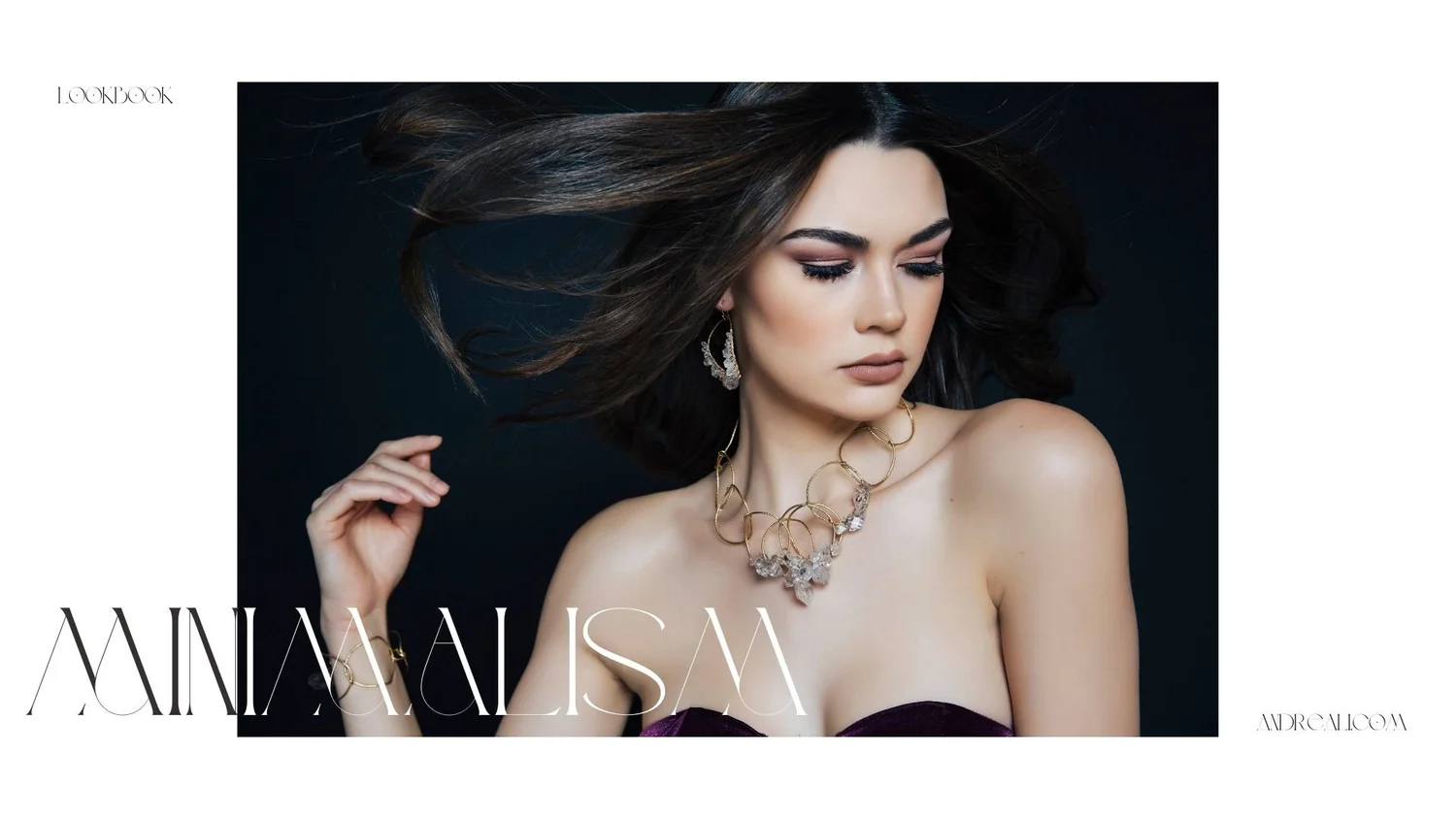 Andrea Li “Minimalism” lookbook cover showing a model in a strapless top wearing a sculptural gold-and-crystal necklace, matching earrings, and bracelet on a moody dark background.