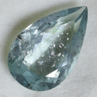Moss aquamarine with web-like green mineral inclusions