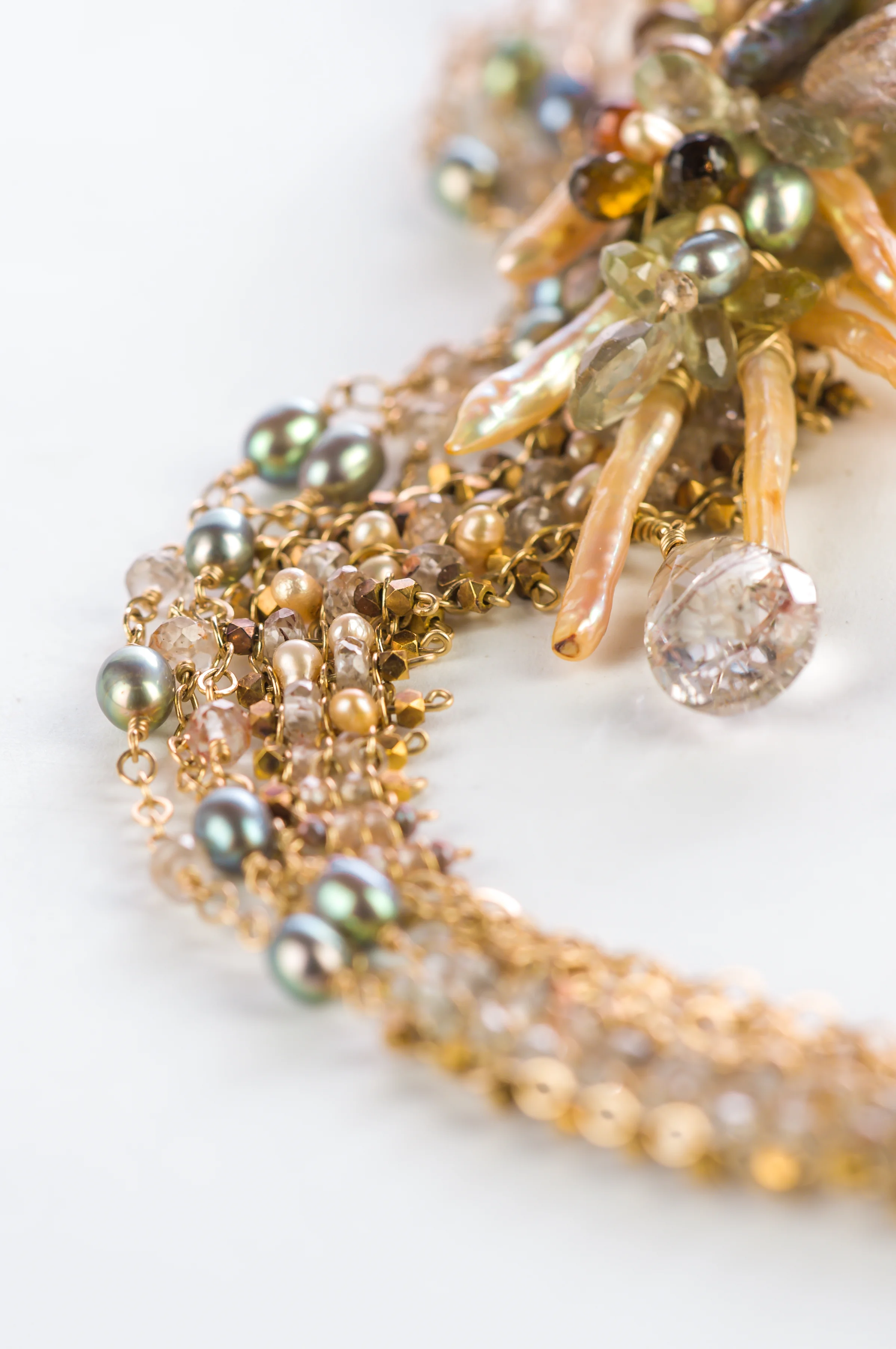gold gemstone necklace details