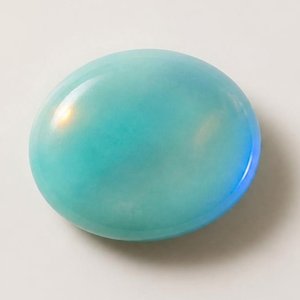 Soft blue green Peruvian opal cabochon