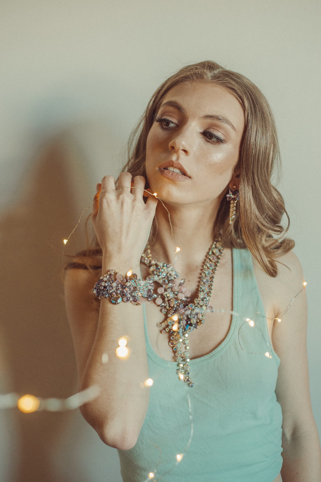 Model wearing statement necklace and cuff