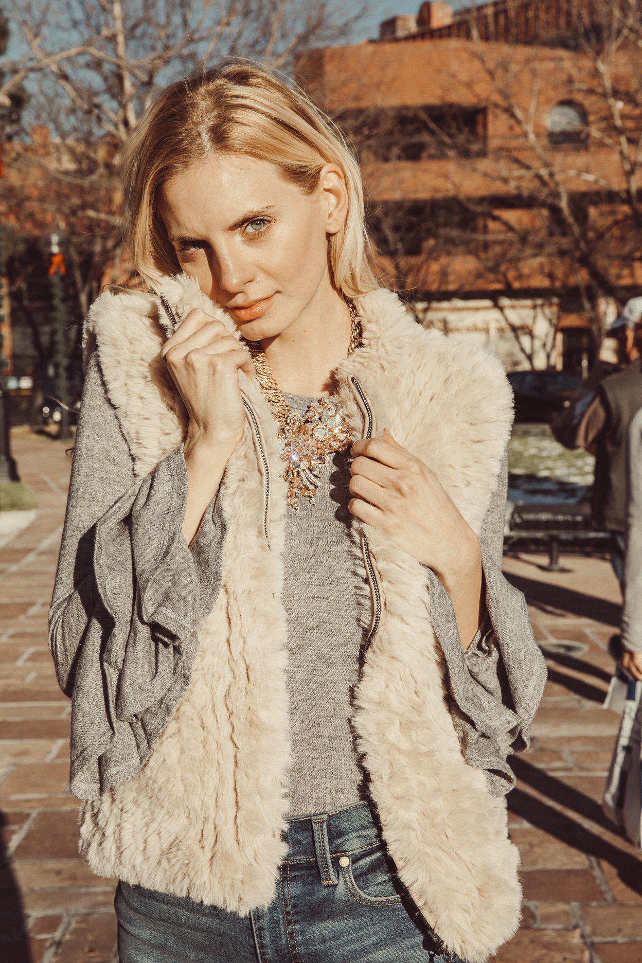 Model wearing statement vintage necklace with sunstones