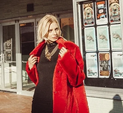 Model wearing asymmetrical vintage statement necklace 