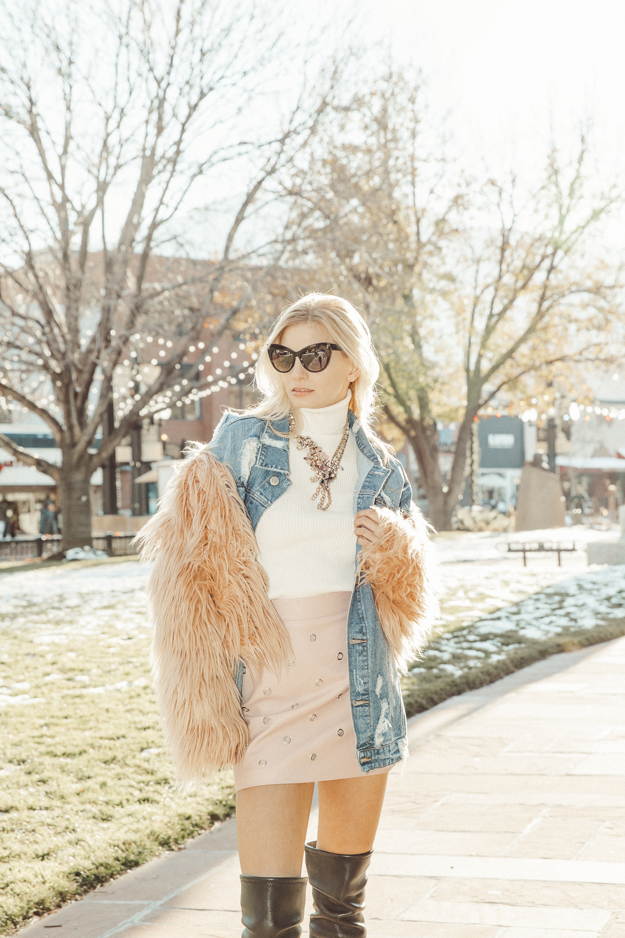 Model wearing statement necklace and cuff