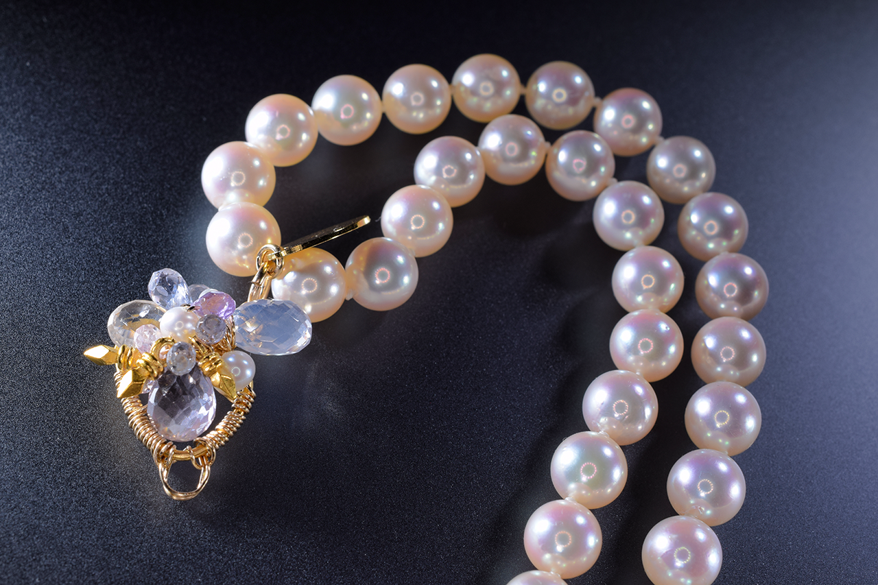 multi strand pearl necklace with gemstone accents