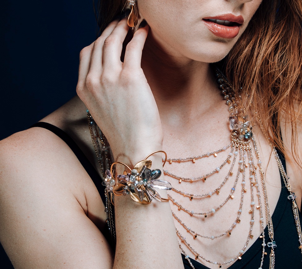 woman wearing gemstone statement cuff