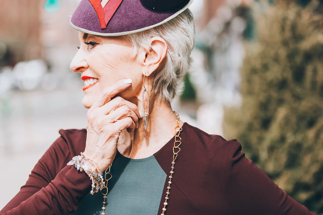 Advanced style blogger Style Crone wearing gemstone earrings