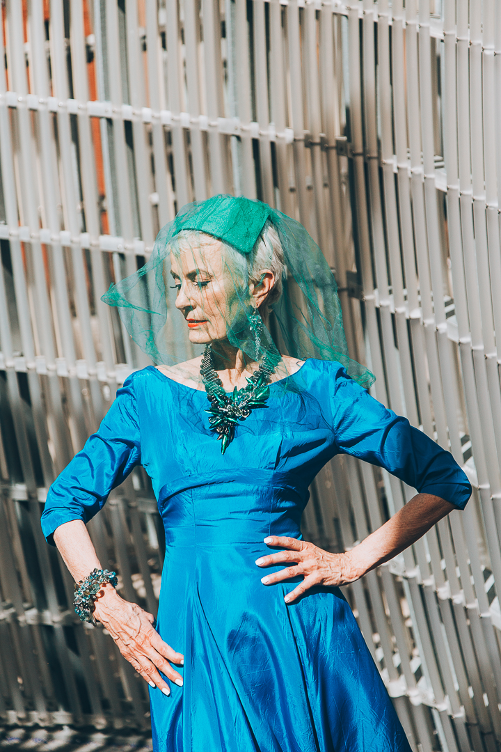 Advanced style blogger Style Crone wearing a statement beetle wing and gemstone necklace 