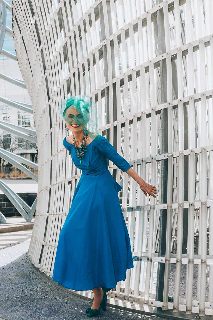 Advanced style blogger Style Crone wearing a statement beetle wing and gemstone necklace 