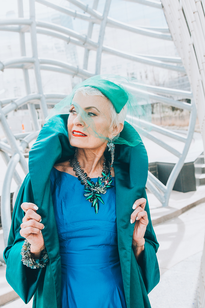 Advanced style blogger Style Crone wearing a statement beetle wing and gemstone necklace 