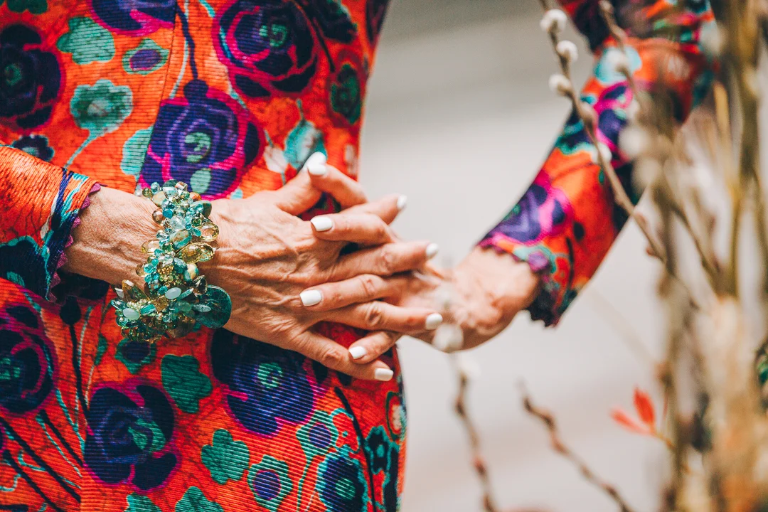 Advanced style blogger Style Crone wearing a statement gemstone cuff bracelet