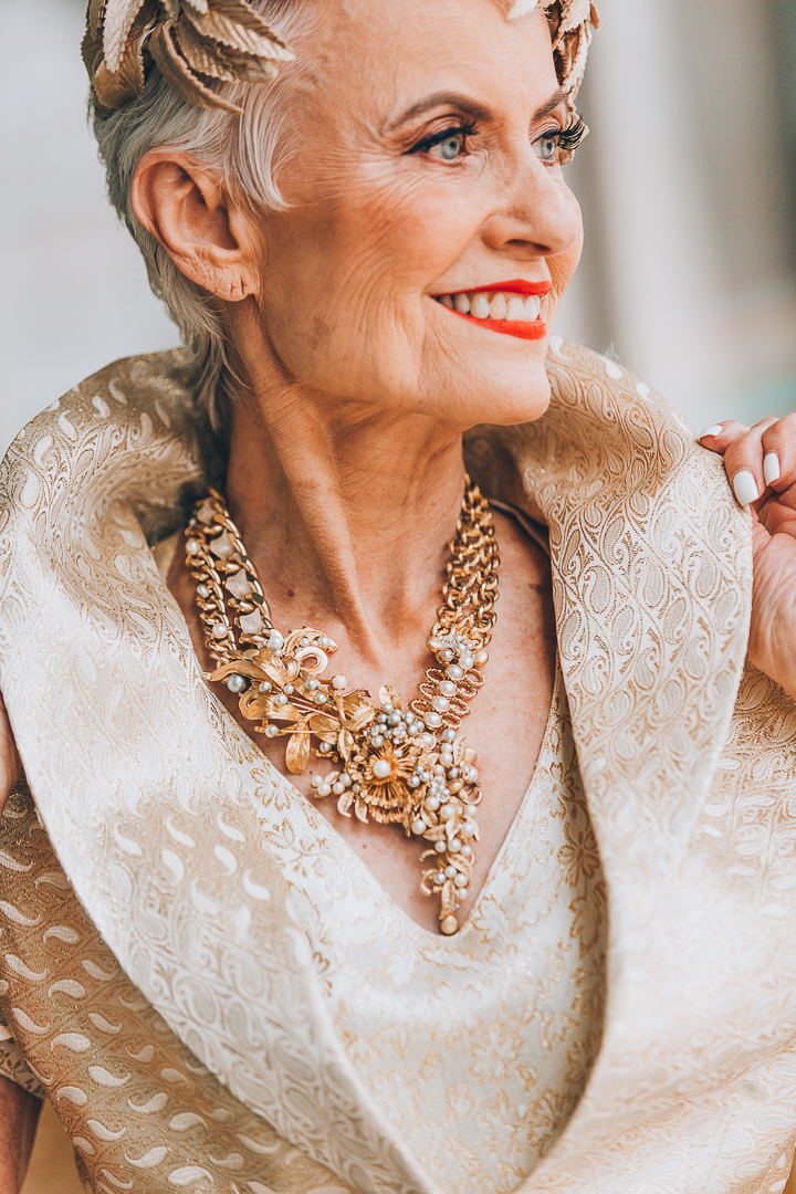 Advanced style blogger Style Crone wearing a statement vintage gold and pearl necklace