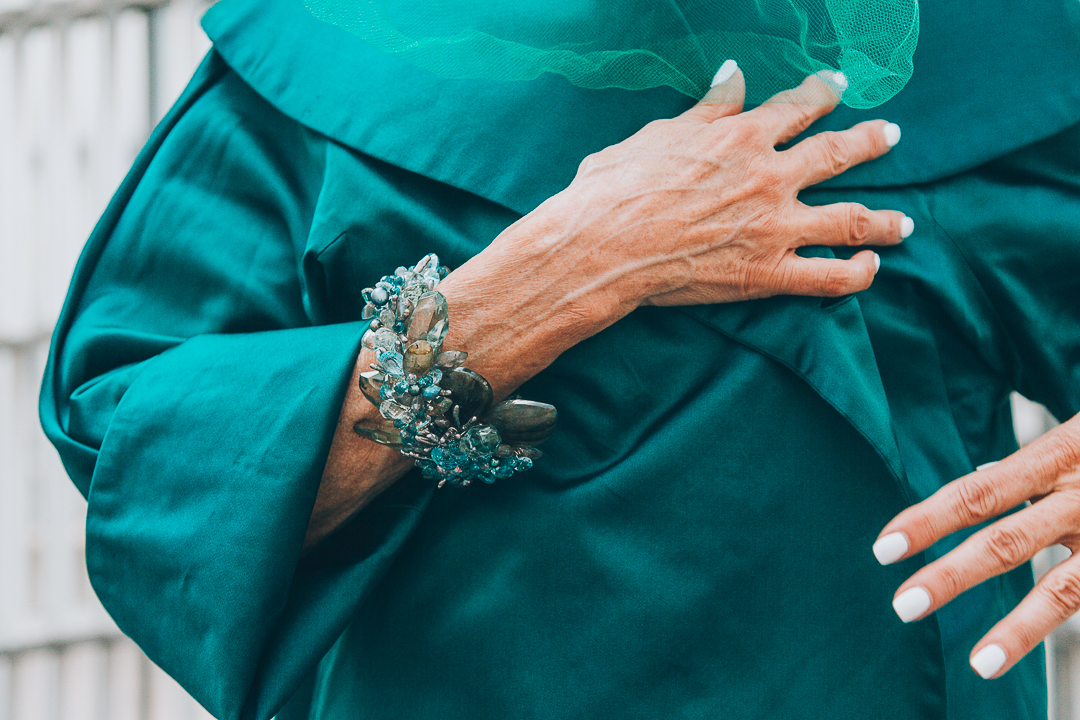 Advanced style blogger Style Crone wearing a statement gemstone cuff bracelet