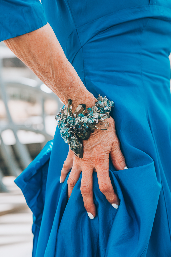 Advanced style blogger Style Crone wearing a statement gemstone cuff bracelet